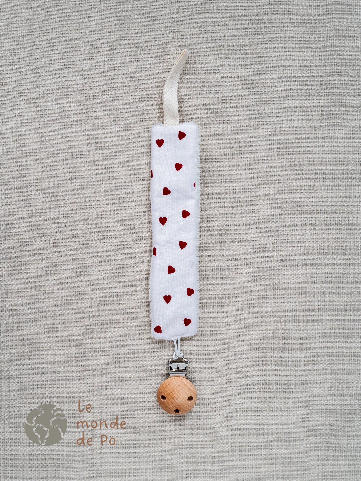 Attache tétine coeurs rouges