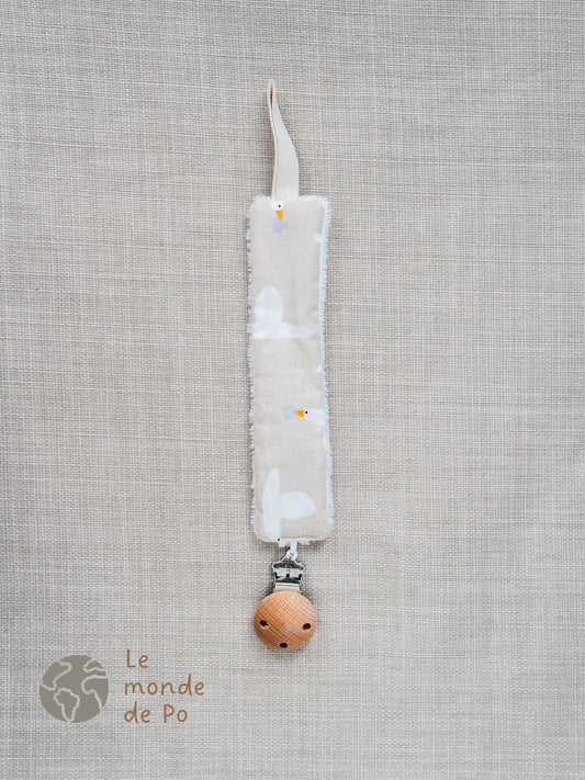 Attache tétine oies volantes