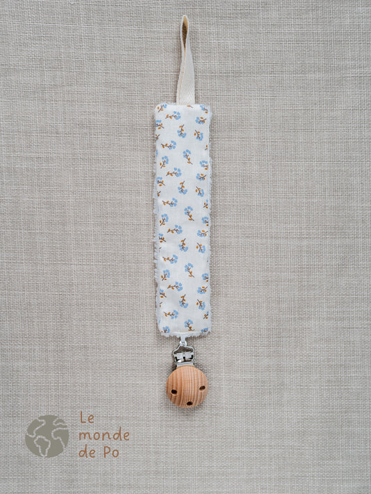 Attache tétine fleurs bleues