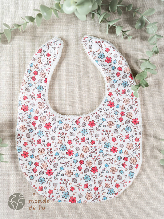 Bavoir fleurs roses et bleues