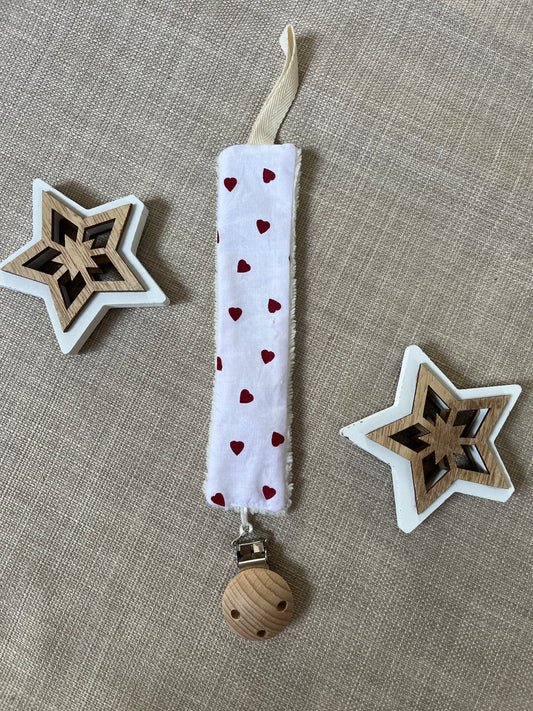 Attache tétine coeurs rouges